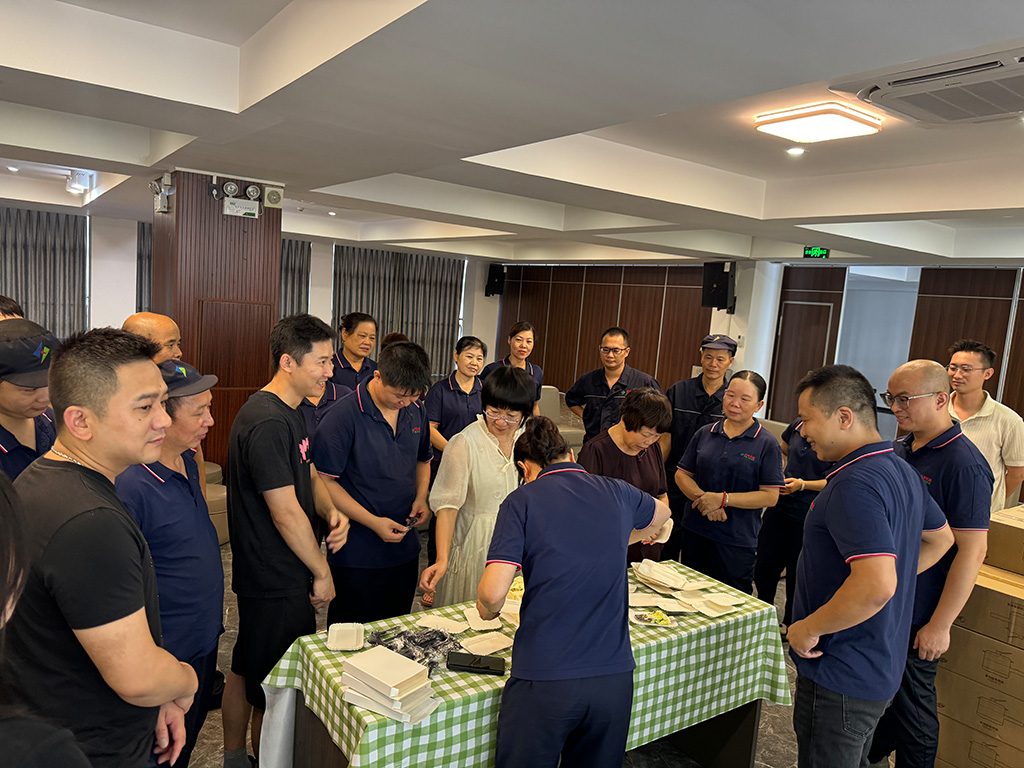 DQ PACK team celebrating the August birthday party at our headquarters-1